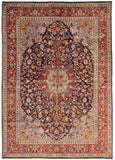 A traditional Sarough handmade/hand-knotted Persian rug with a floral and geometric pattern in multicolor.