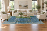 24624 Royal Vasighi blue rug staged under living room furniture