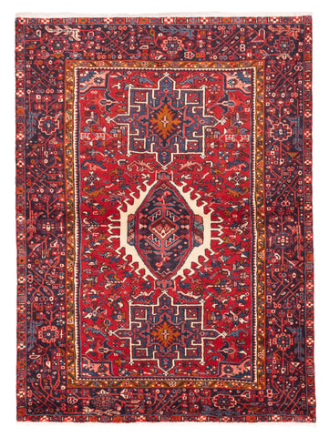 Decorative red rug with intricate patterns on a plain background