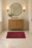 SKU 24226 original handmade Persian rug staged horizontally in a powder room; Rocket1 approved room image.
